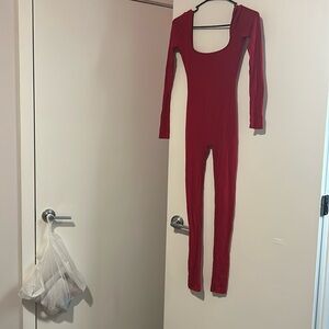 all red back out jumper/bodysuit